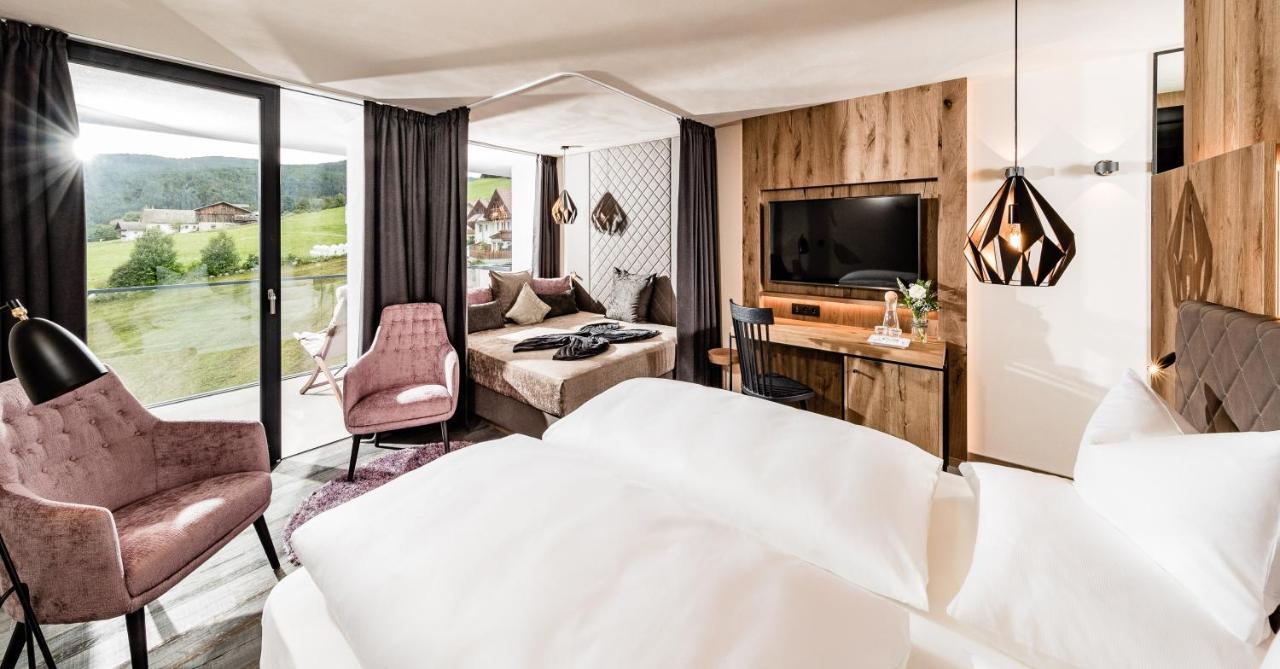 Sonnenberg Panorama Dolomites Wellbeing Hotel Maranza Exterior foto